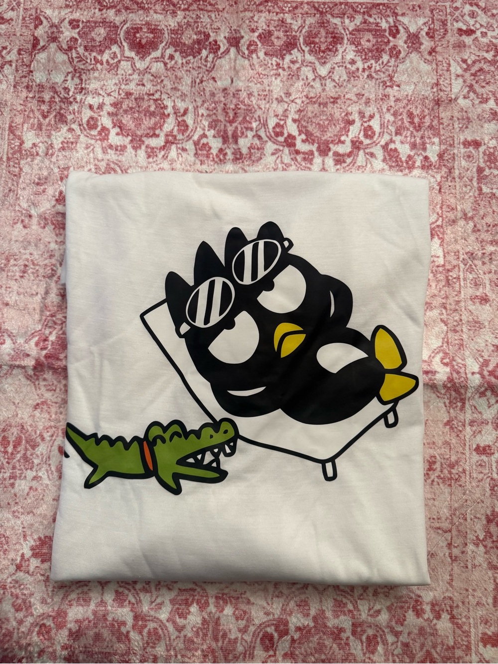 Graphic White Tee with Black Cartoon Penguin and Green Crocodile Badtz-Maru